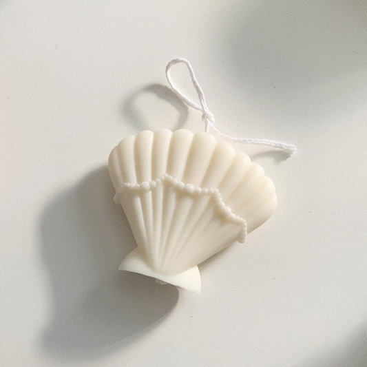pearl seashell candle